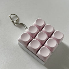 2-Pack Light Pink Mechanical 9-Keyboard Fingertip Toy Keychain - Key Pressure Relief, PVC Fingertip Toy