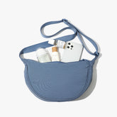 Sea blue Lightweight Nylon Crossbody Bag – Compact Saddle Style with Adjustable Strap for Everyday Use