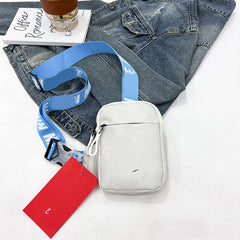 Unisex Mini Nylon Crossbody Sling Bag Chest Pouch Adjustable Wide Strap Lightweight Beige for Travel Sports & Festivals