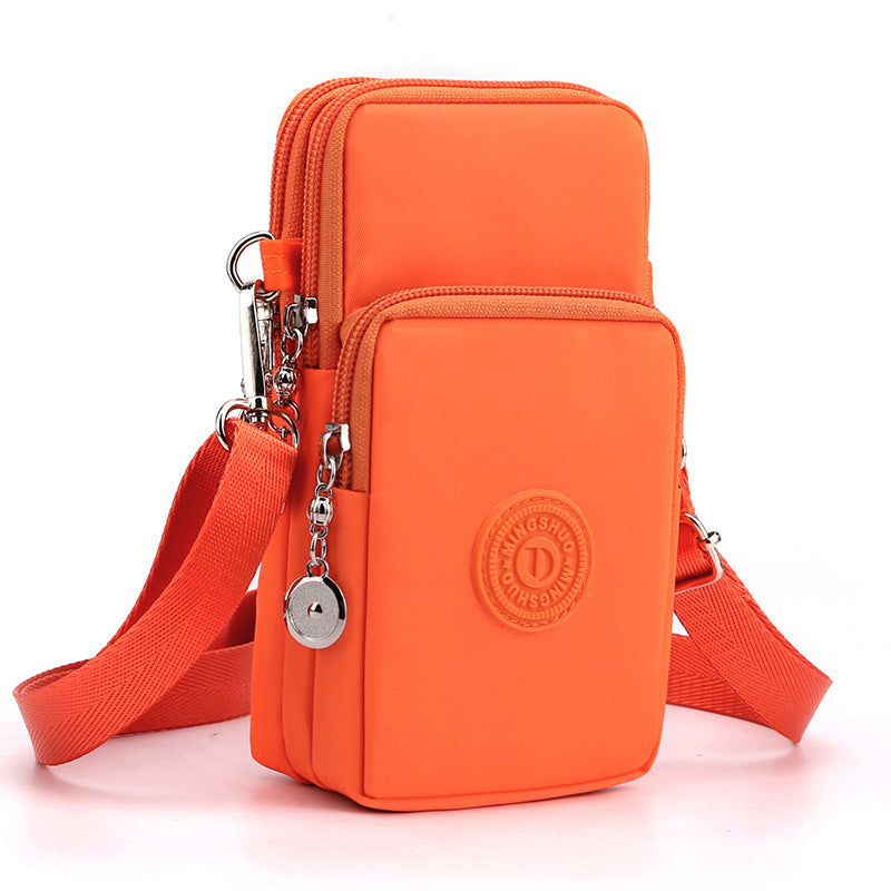 Orange 3-Layer Waterproof Nylon Vertical Crossbody Phone Bag - Lightweight Phone Purse with Headphone Jack & Adjustable Strap