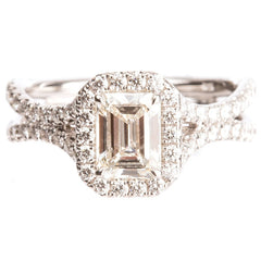 18KT White Gold 1.71ctw Diamond Halo with 1ctw Emerald Cut Centre Stone Ring