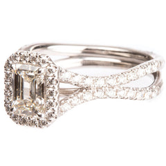 18KT White Gold 1.71ctw Diamond Halo with 1ctw Emerald Cut Centre Stone Ring