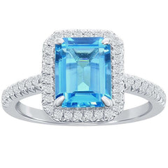 18KT White Gold 0.24ctw Round Diamond Halo Blue Topaz Ring