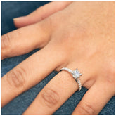 18KT White Gold 0.78ctw Diamond Ring With 0.50ctw Centre Stone