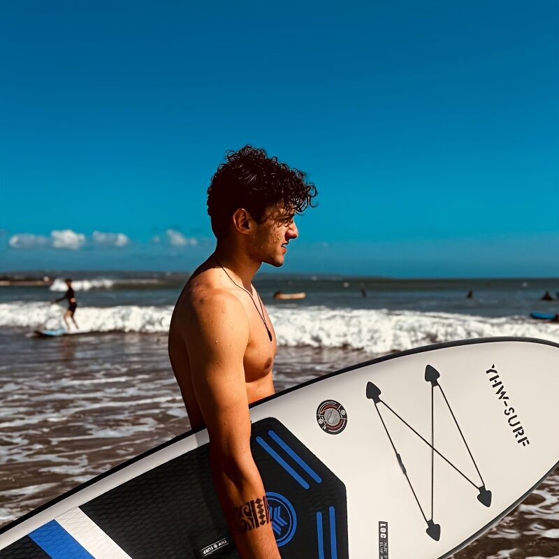 Inflatable vertical paddle set for water sports and surfing-including air pump, paddle, rope, backpack, fin box and maintenance tools.