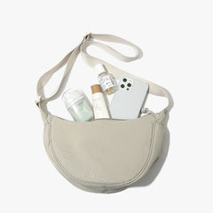 Beige Lightweight Nylon Crossbody Bag – Compact Saddle Style with Adjustable Strap for Everyday Use